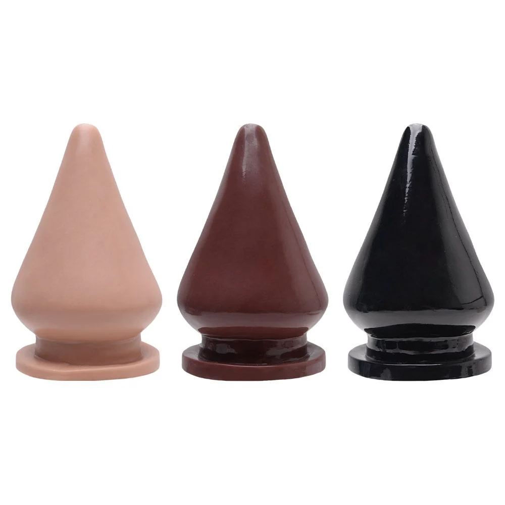 Descubra o Plug Anal Maciço Gigante 20 X 12Cm Kgel. Formato triangular, base larga e material seguro para sensações extremas e profundas.